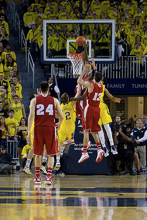 Ricky Doyle (32) and Derrick Walton Jr. (10)