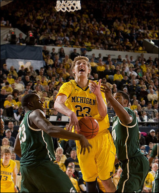 Matt Vogrich (13) and Evan Smotrycz (23)