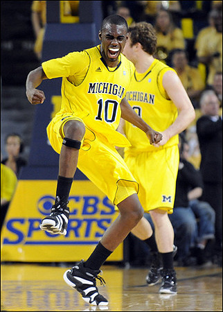 Tim Hardaway Jr. (10) and Zack Novak (0)