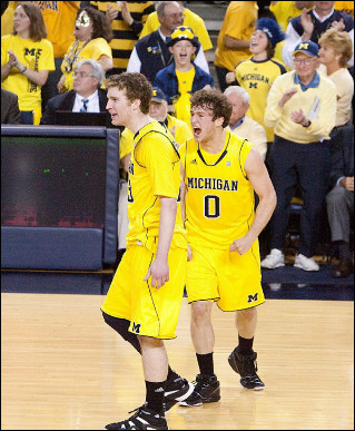 Evan Smotrycz (23) and Zack Novak (0)