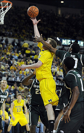 Matt Vogrich (13) and Evan Smotrycz (23)
