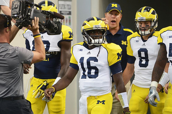 Devin Gardner (12), Denard Robinson (16), and Russell Bellomy (8)