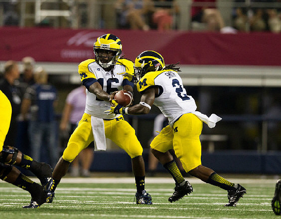 Denard Robinson (16) and Vincent Smith (2)