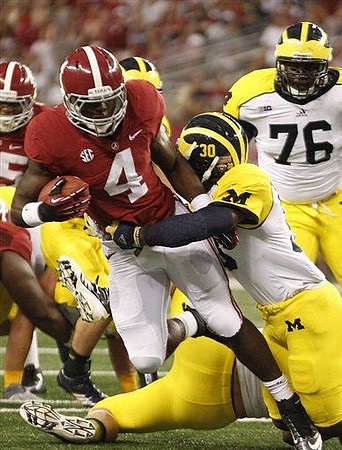 Thomas Gordon (30) and Quinton Washington (76)