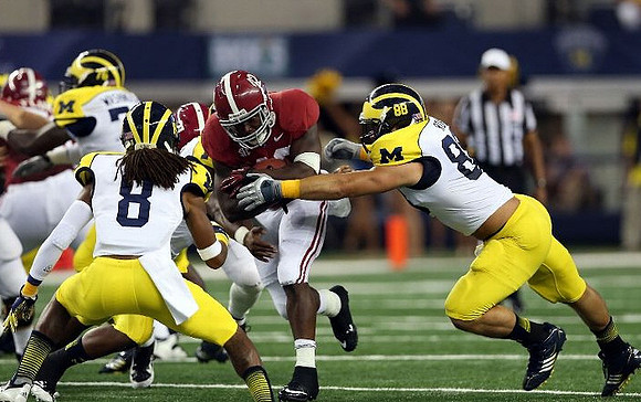 J.T. Floyd (8), Quinton Washington (76), and Craig Roh (88)