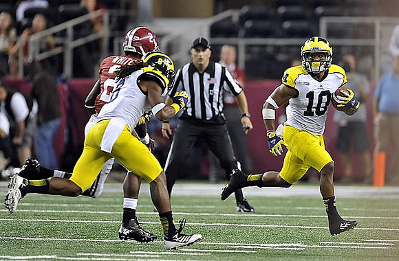 J.T. Floyd (8) and Jeremy Gallon (10)