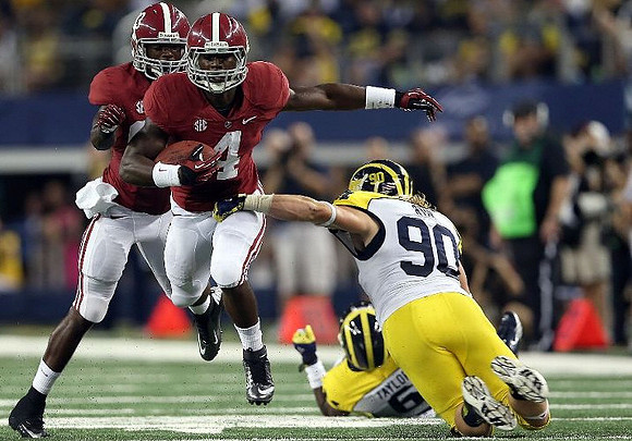 Raymon Taylor (6) and Jake Ryan (90)