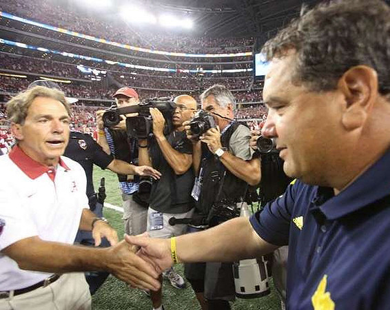 Nick Saban and Brady Hoke