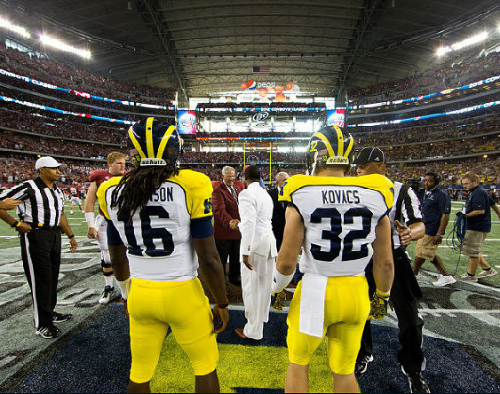 Denard Robinson (16) and Jordan Kovacs (32)