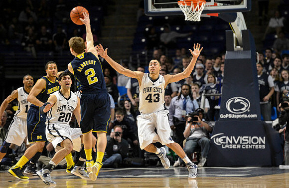 Nik Stauskas (11) and Jordan Morgan (52)