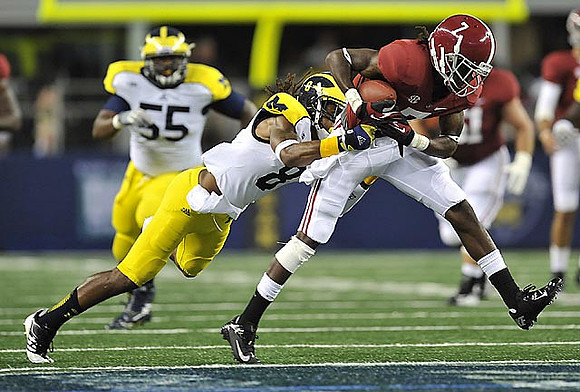 Jibreel Black (55) and J.T. Floyd (8)