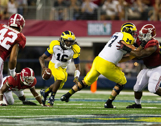 Denard Robinson (16) and Taylor Lewan (77)