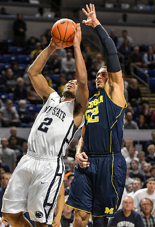 Tim Hardaway Jr. (10), Trey Burke (3), and Jordan Morgan (52)