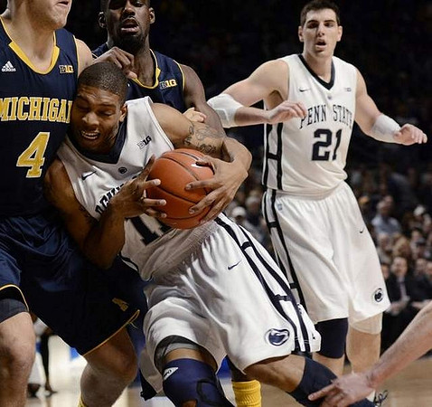 Mitch McGary (4) and Tim Hardaway Jr. (10)