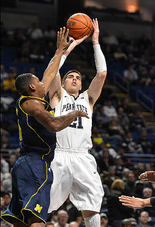 Jordan Morgan (52) and Glenn Robinson III (1)