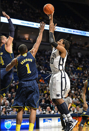 Jordan Morgan (52) and Trey Burke (3)