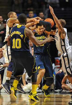 Mitch McGary (4) and Nik Stauskas (11)