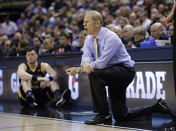 Ricky Doyle (32) and John Beilein