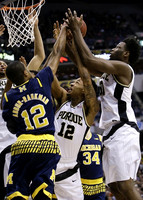 Muhammad-Ali Abdur-Rahkman (12) and Mark Donnal (34)