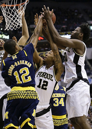 Muhammad-Ali Abdur-Rahkman (12) and Mark Donnal (34)