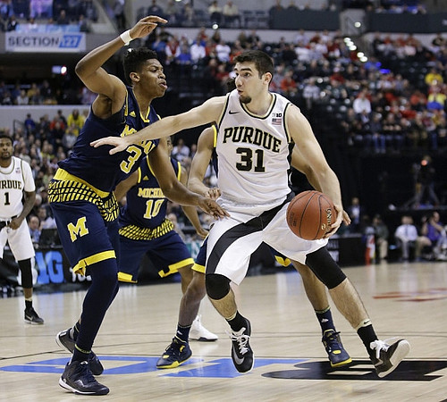 Kameron Chatman (3) and Derrick Walton Jr. (10)