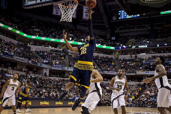 Muhammad-Ali Abdur-Rahkman (12) and Derrick Walton Jr. (10)