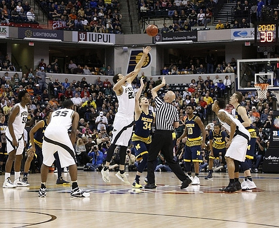 Zak Irvin (21), Mark Donnal (34), Derrick Walton Jr. (10), Muhammad-Ali Abdur-Rahkman (12), and Duncan Robinson (22)