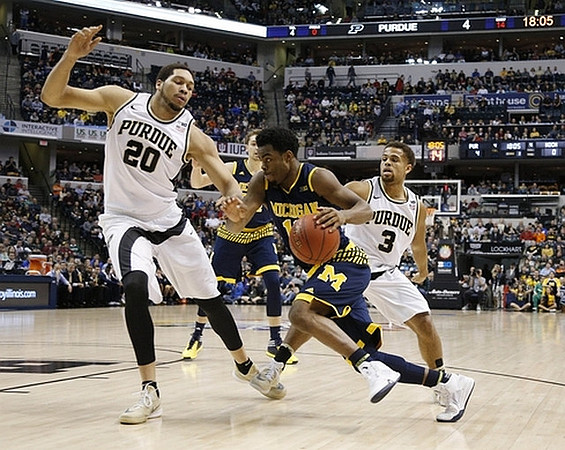 Derrick Walton Jr. (10) and Mark Donnal (34)