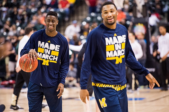 Caris LeVert (23) and Zak Irvin (21)