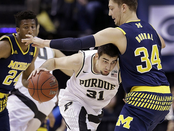 Aubrey Dawkins (24) and Mark Donnal (34)