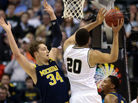 Mark Donnal (34) and Zak Irvin (21)