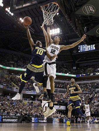 Derrick Walton Jr. (10) and Zak Irvin (21)
