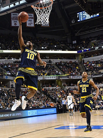 Derrick Walton Jr. (10) and Zak Irvin (21)