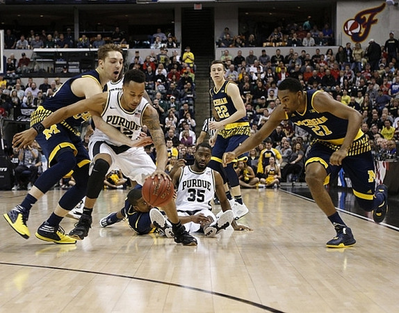 Mark Donnal (34), Muhammad-Ali Abdur-Rahkman (12), Duncan Robinson (22), and Zak Irvin (21)