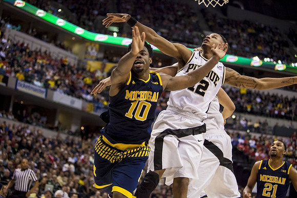 Derrick Walton Jr. (10) and Zak Irvin (21)