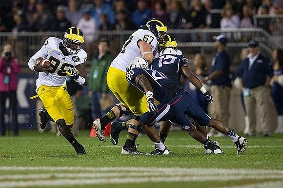 Devin Gardner (98) and Kyle Kalis (67)