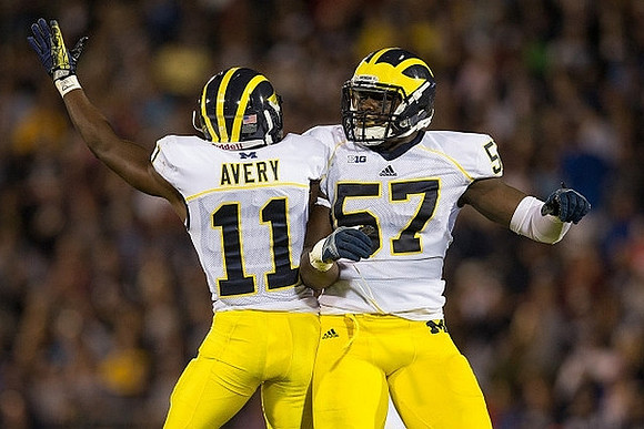 Courtney Avery (11) and Frank Clark (57)