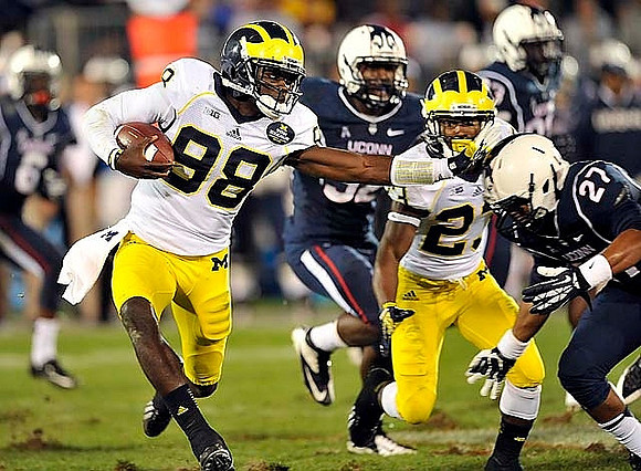 Devin Gardner (98) and Dennis Norfleet (23)