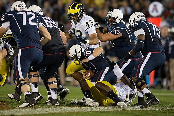 Brennen Beyer (97) and Chris Wormley (43)