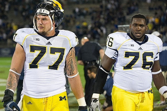 Taylor Lewan (77) and Quinton Washington (76)