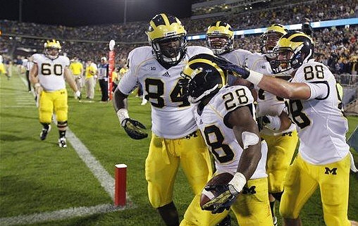 Fitzgerald Toussaint (28), A.J. Williams (84), Jake Butt (88), and Jack Miller (60)