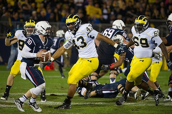 Chris Wormley (43) and Willie Henry (69)