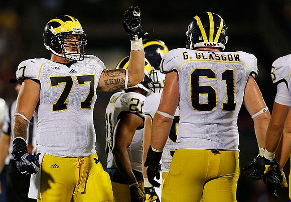 Taylor Lewan (77), Jeremy Gallon (21), and Graham Glasgow (61)