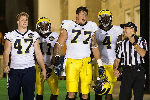 Jake Ryan (47), Courtney Avery (11), Taylor Lewan (77), and Cameron Gordon (4)