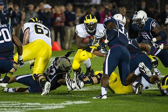 Kyle Kalis (67), Fitzgerald Toussaint (28), and Michael Schofield (75)