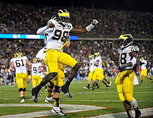 Devin Gardner (98), Fitzgerald Toussaint (28), Graham Glasgow (61), and Drew Dileo (9)