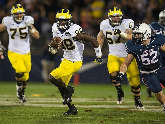 Michael Schofield (75), Devin Gardner (98), and Kyle Kalis (67)