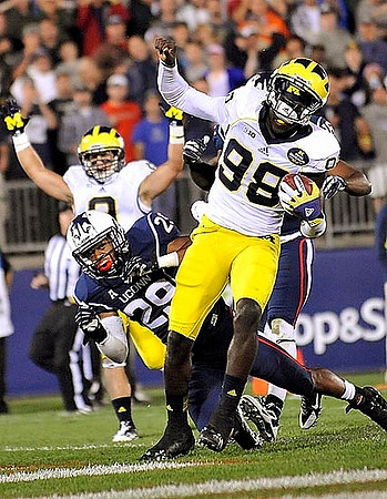 Drew Dileo (9) and Devin Gardner (98)