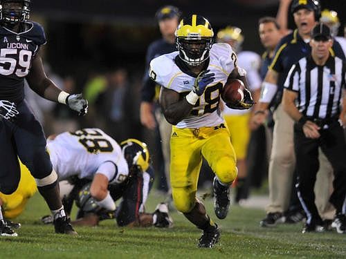 Jake Butt (88) and Fitzgerald Toussaint (28)