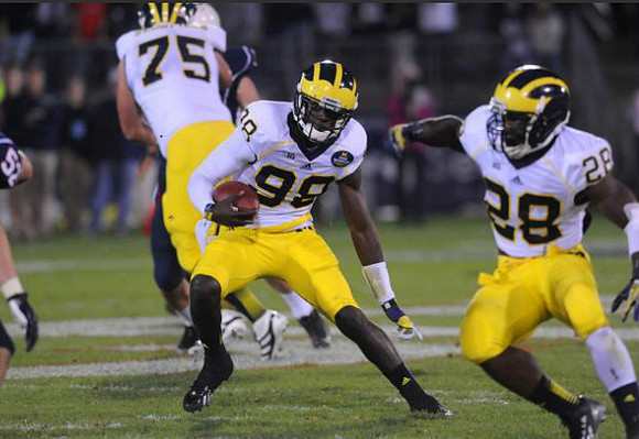 Michael Schofield (75), Devin Gardner (98), and Fitzgerald Toussaint (28)